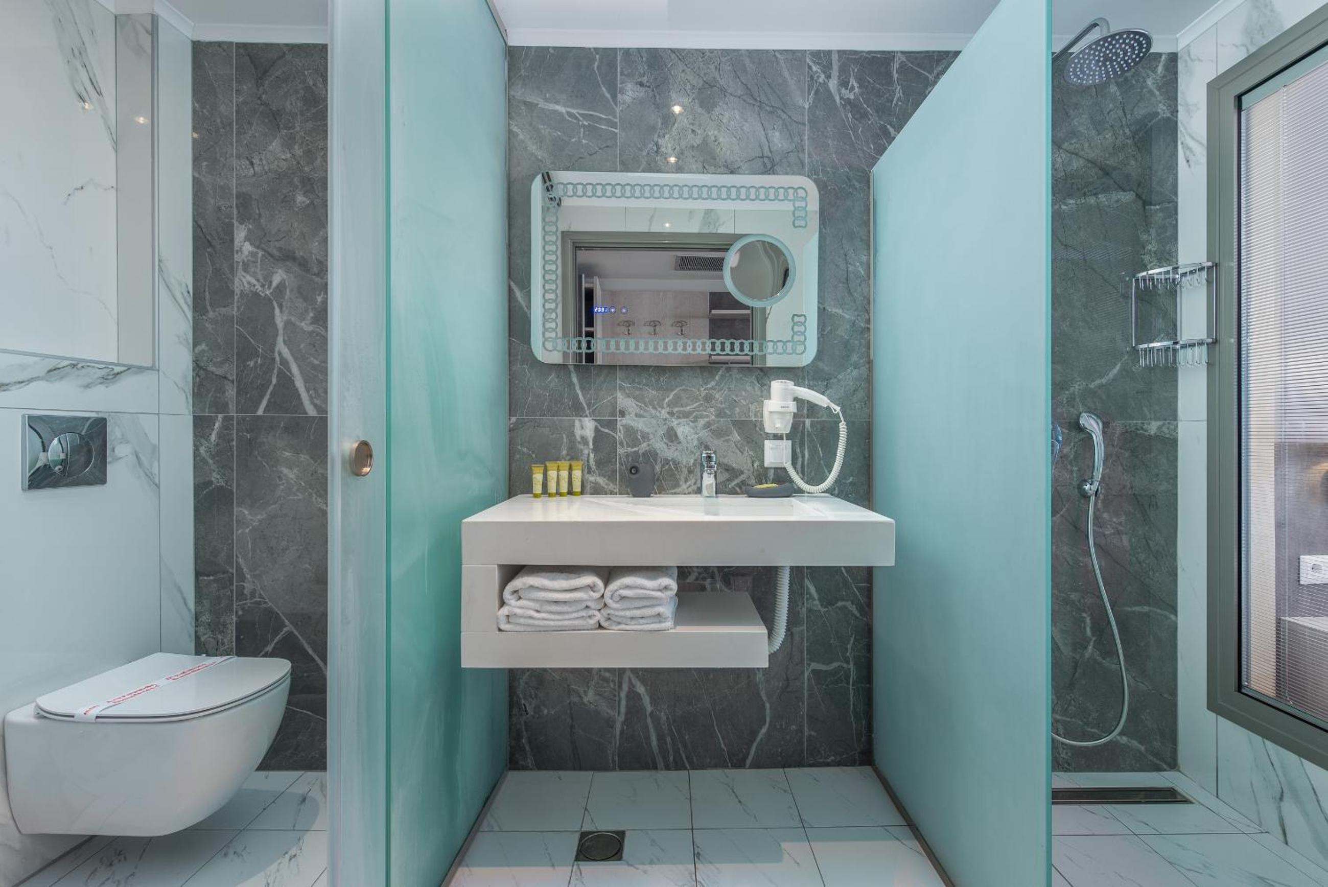 Фото Dionysos Hotel & Suites