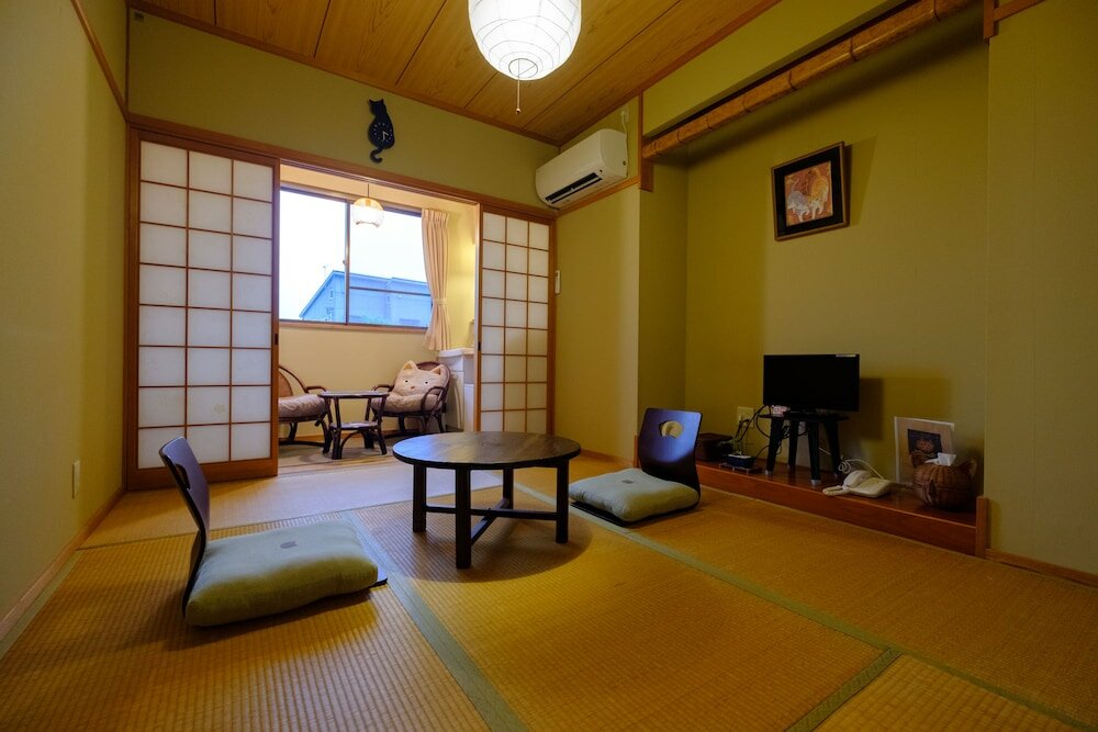 Фото Yufuin Waraneko no Yado