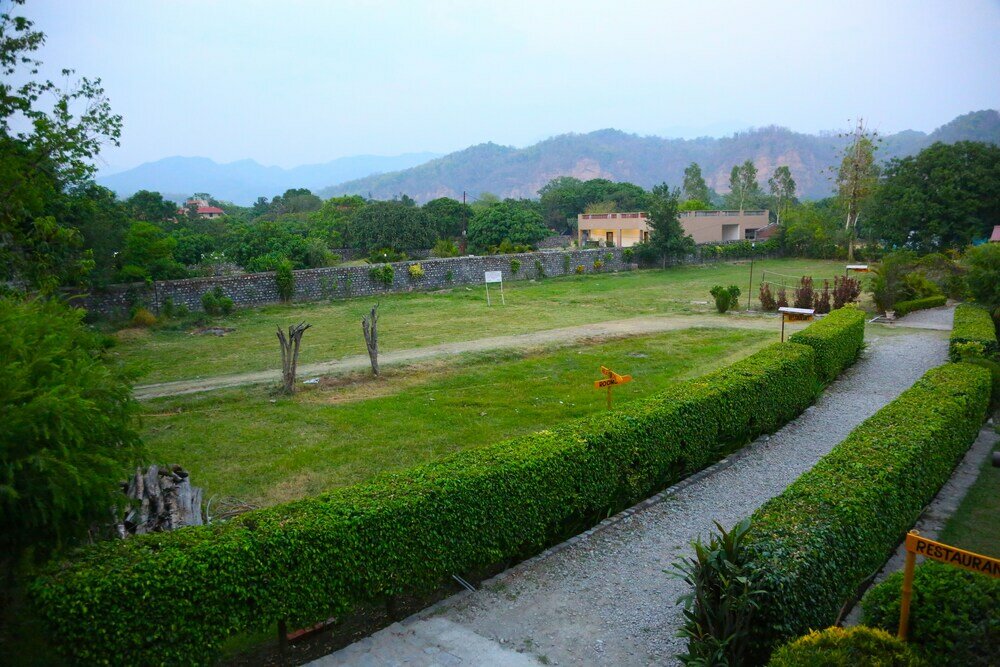 Фото Corbett Wild Resort - A River Access Property