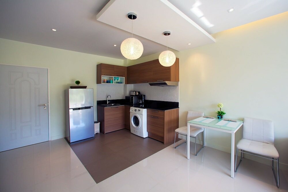 Фото The Lago Apartments by Tropiclook