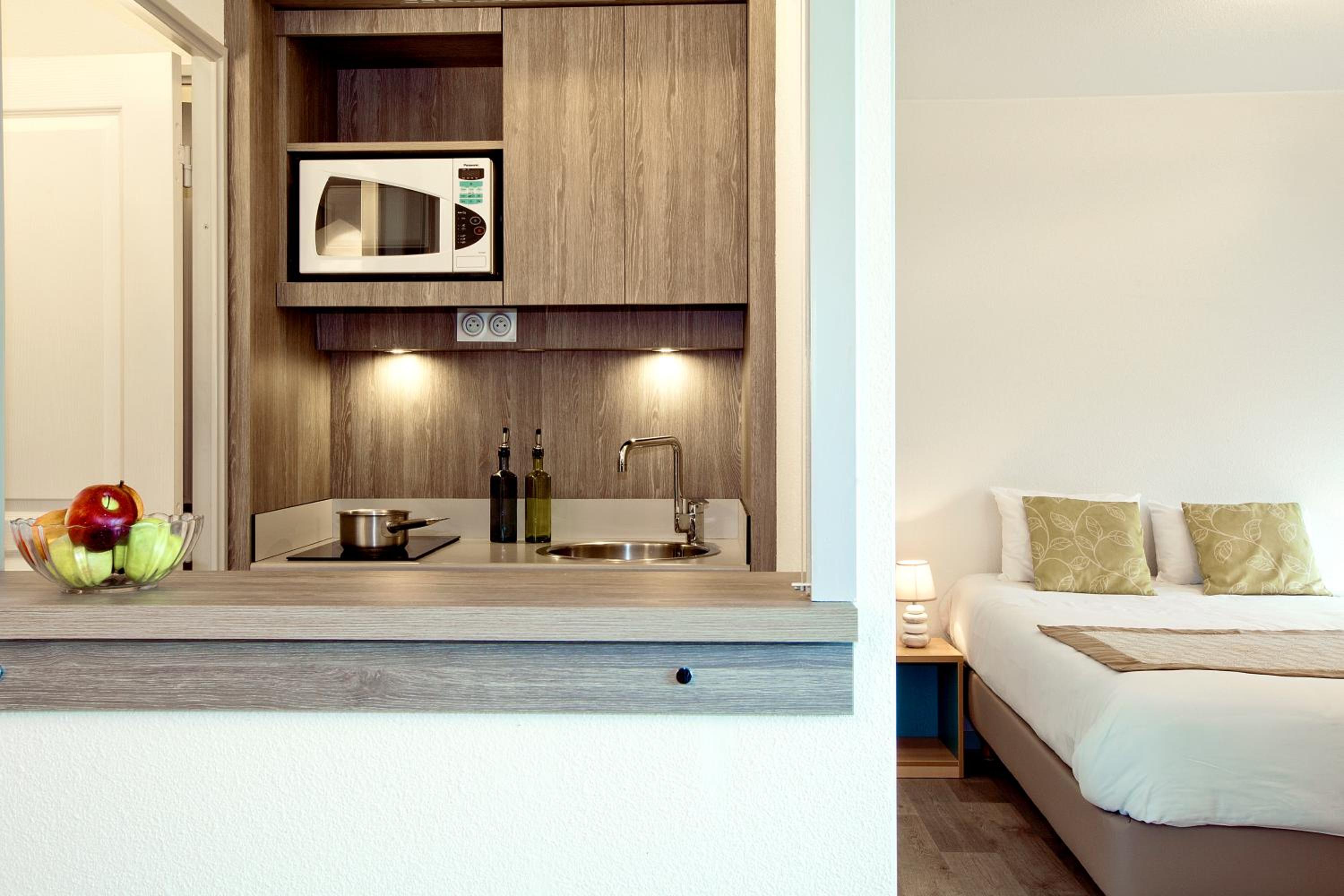 Фото Séjours & Affaires Clermont Ferrand Park République