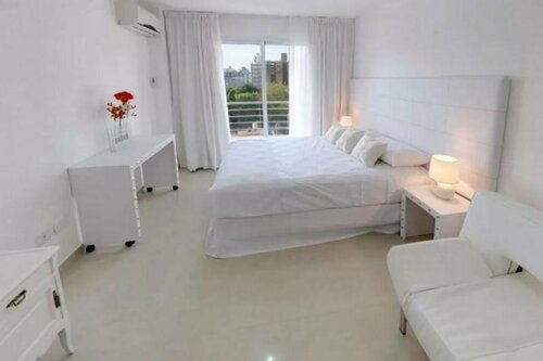 Гостиница Lofts & Suites Rosario в Росарио