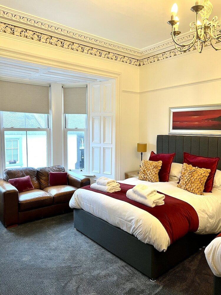 Фото Bythesea Guest House