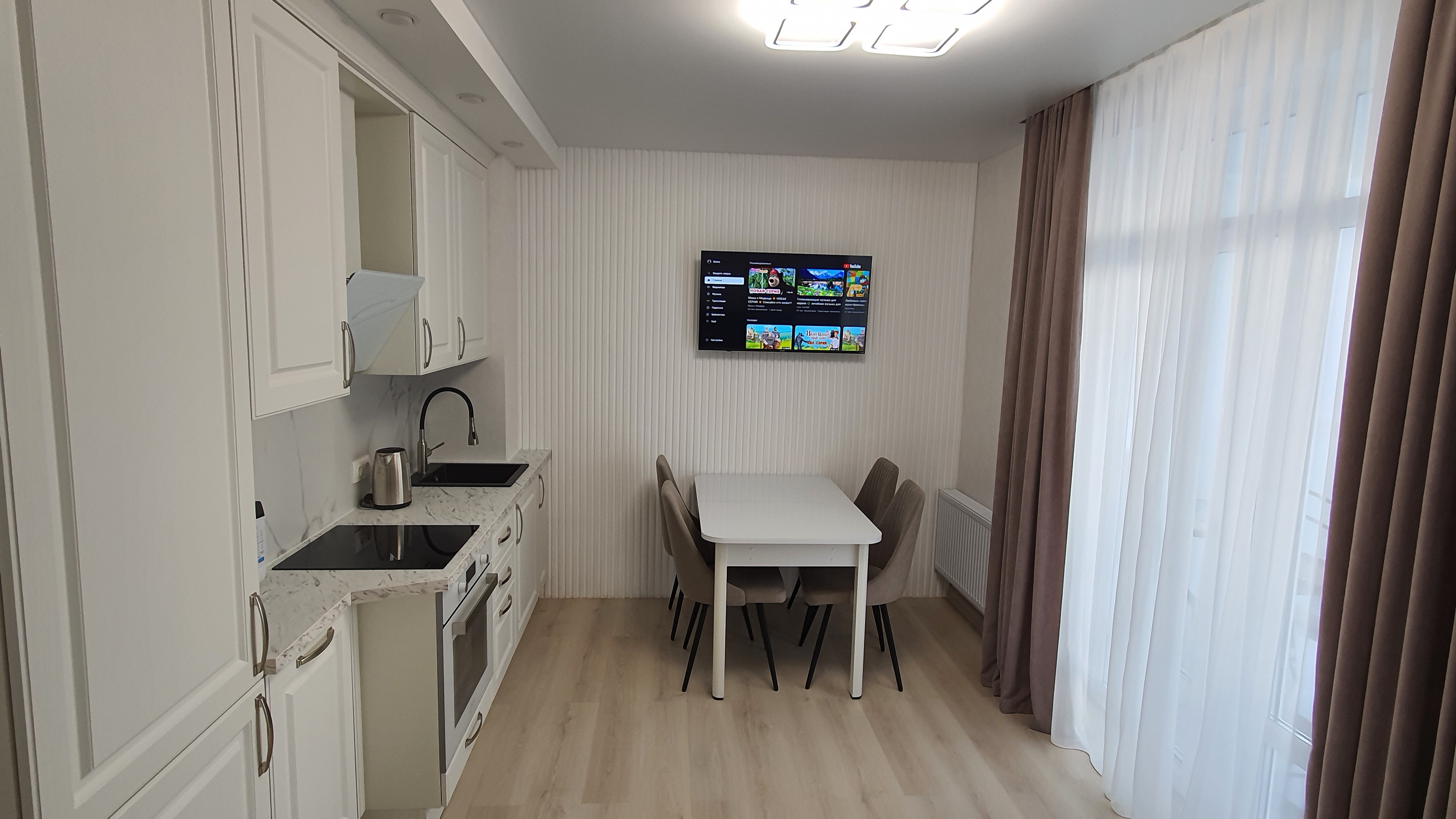 Фото Видовые апартаменты с парковкой около набережной и аквапарка Ривьера