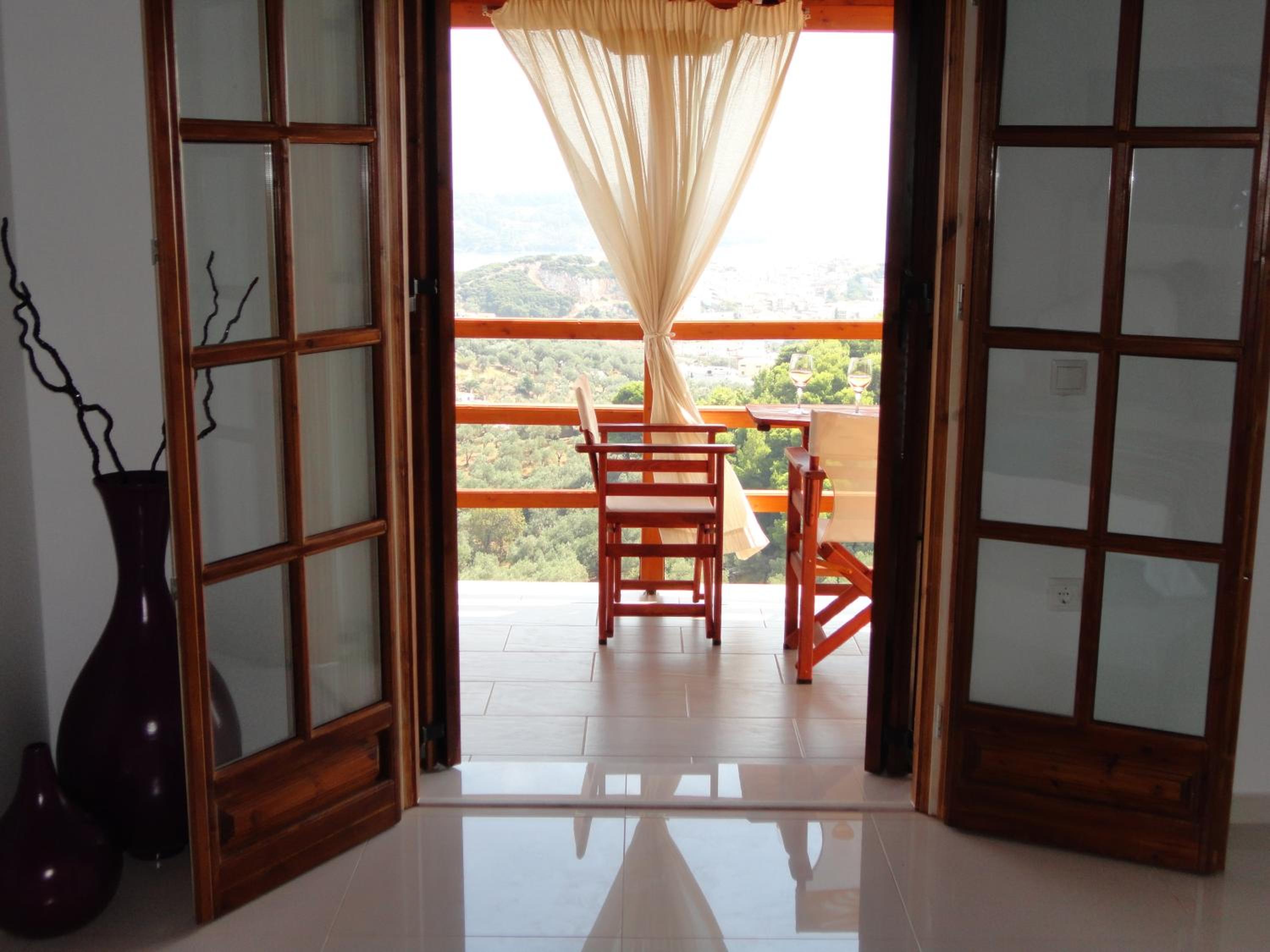 Фото Skiathos Garden Cottages