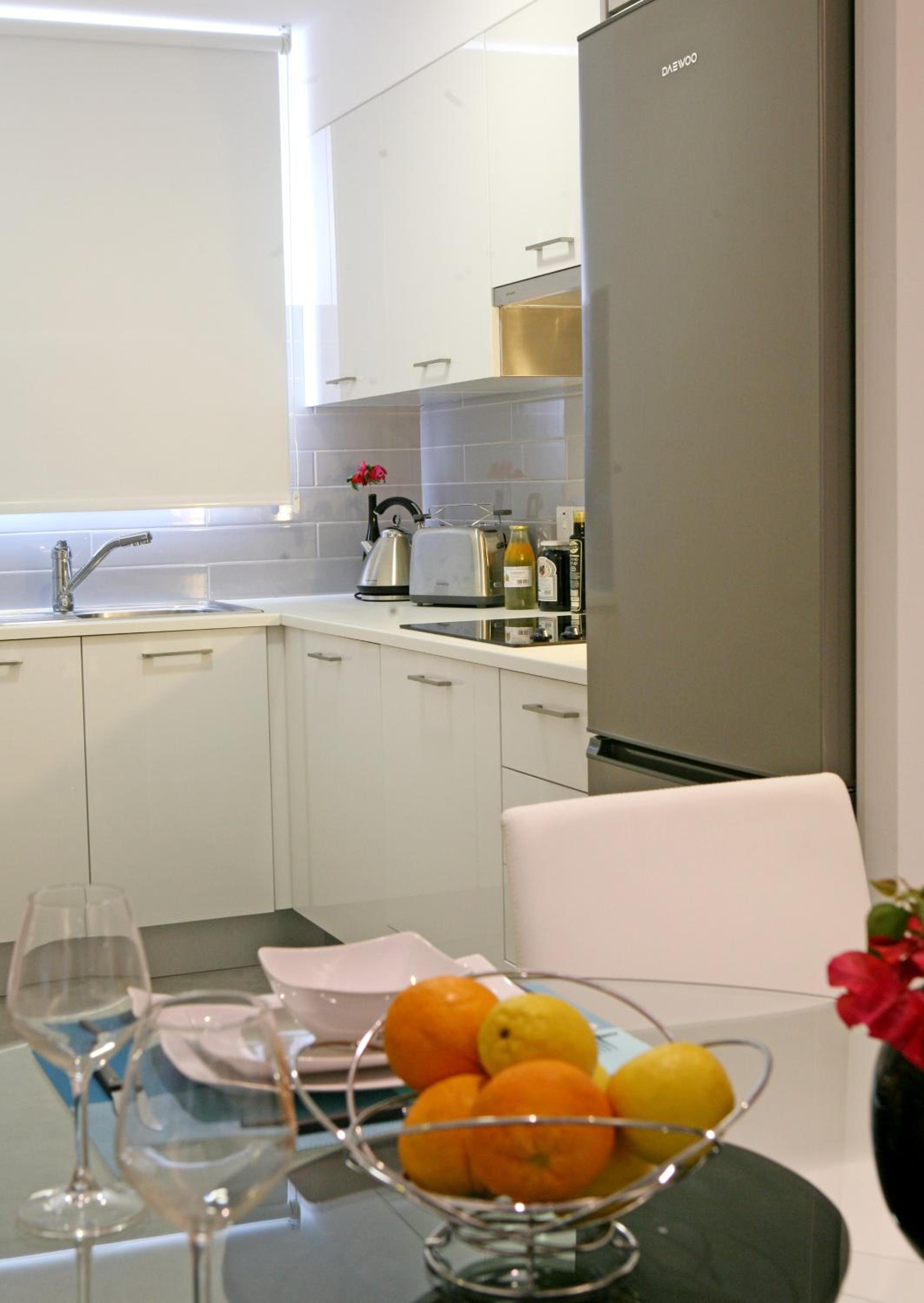 Фото Corina Suites and Apartments