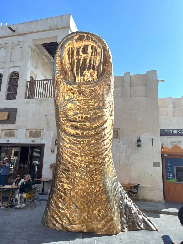 Landmark, attraction The Golden Thumb Statue, Doha, photo