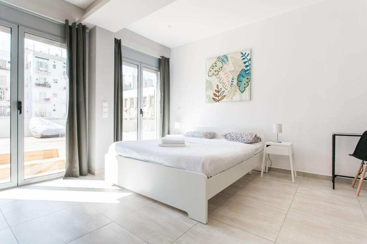 Фото Omnia Pagrati Apartments