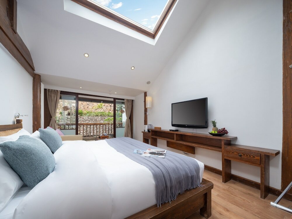 Фото Merry Inn Lijiang