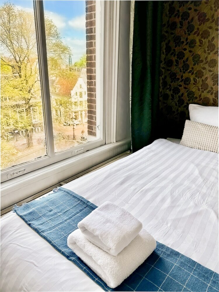 Фото Amsterdam Inn Hotel