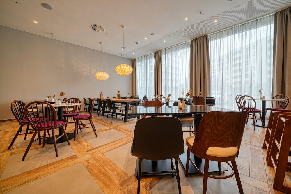 Фото FourSide Hotel Freiburg Trademark Collection by Wyndham