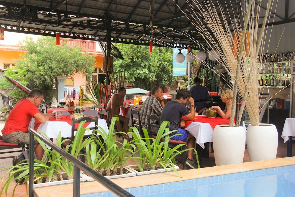 Фото Tropical Breeze Guesthouse