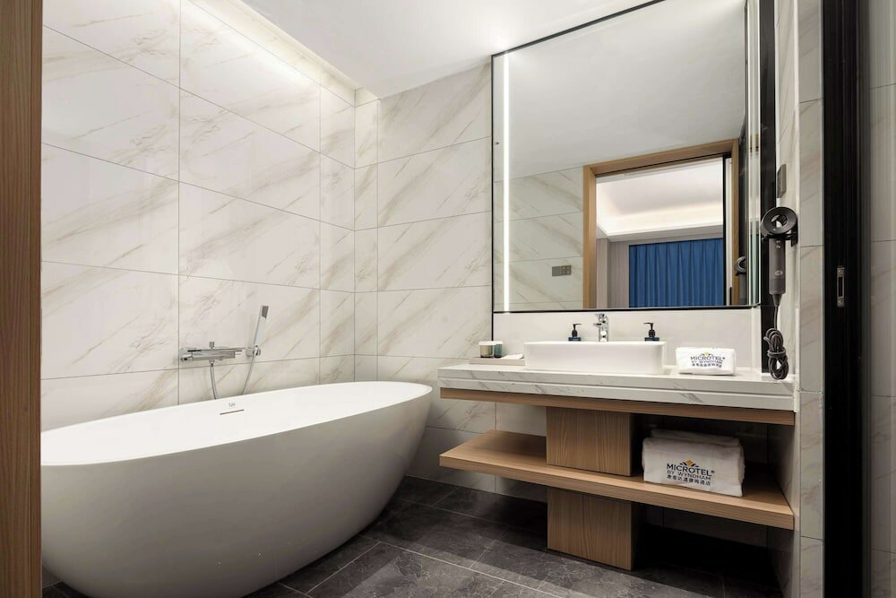 Фото Microtel by Wyndham Qingdao Huangdao