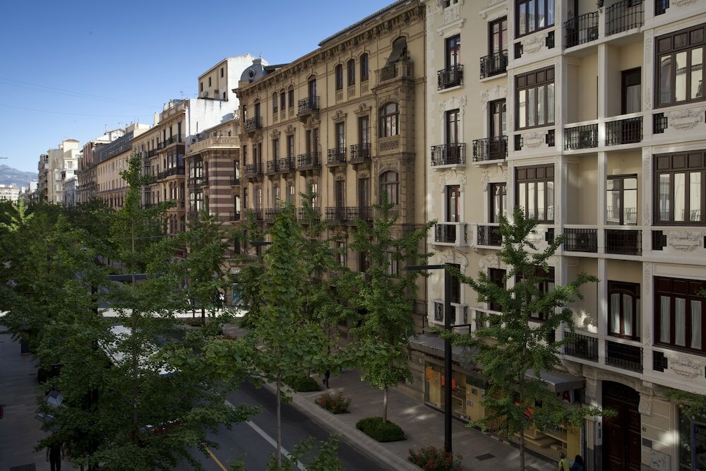 Фото Suites Gran VIA 44 Apartahotel