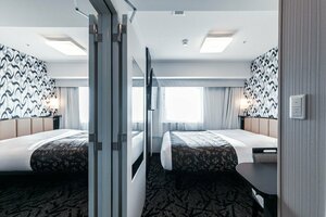 Гостиница Apa Hotel ＆ Resort Midosuji Hommachi Eki Tower