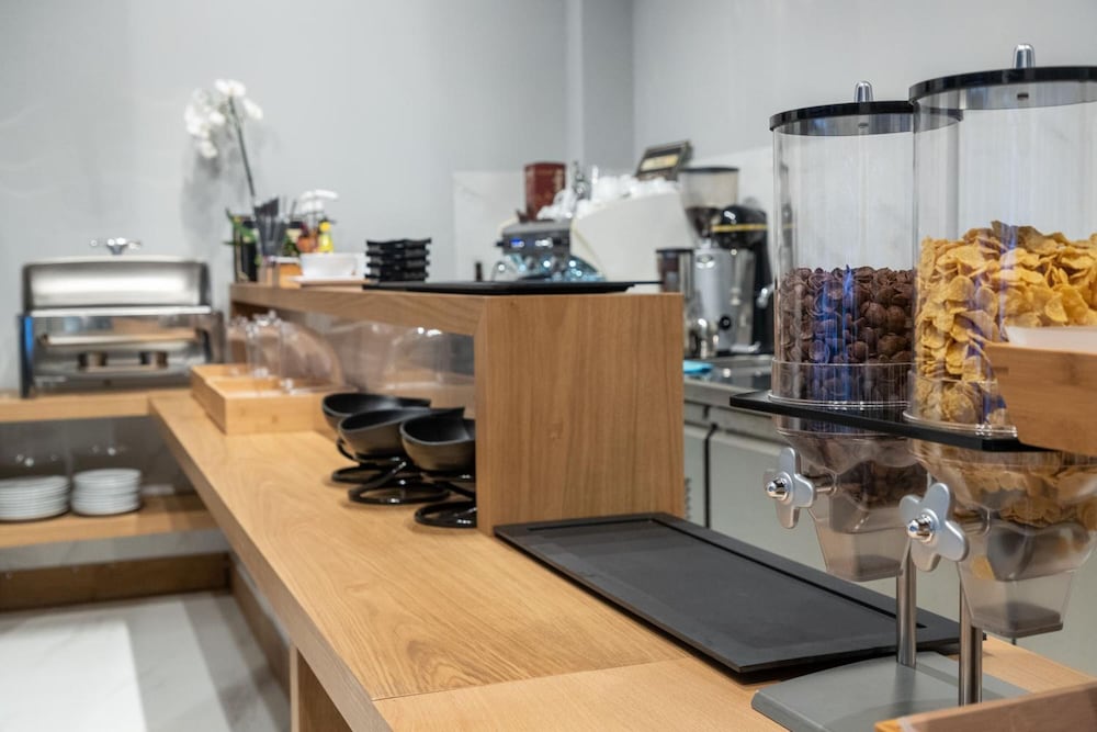 Фото Grand Port Suites Thessaloniki