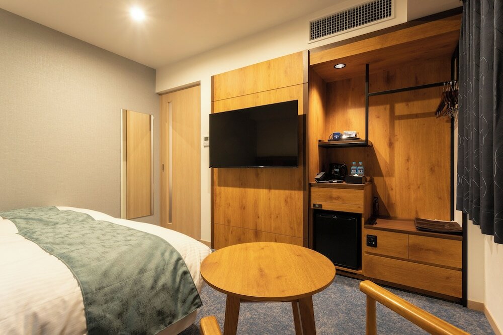 Фото Amami Sunplaza Hotel