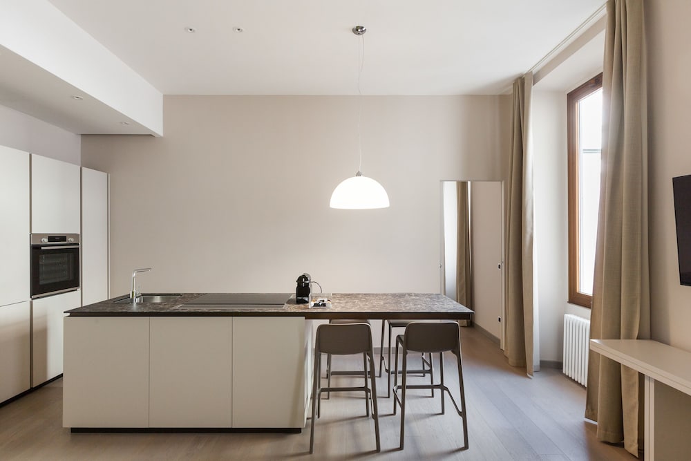 Фото Easyhomes - Duomo Suites & Apartments