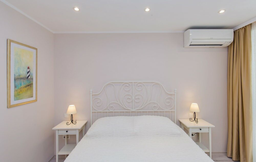 Фото Light Blue Apartment