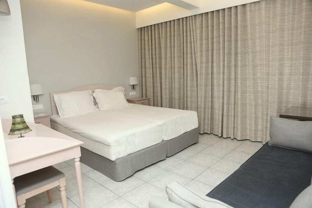 Фото Maria Plomari Apartments