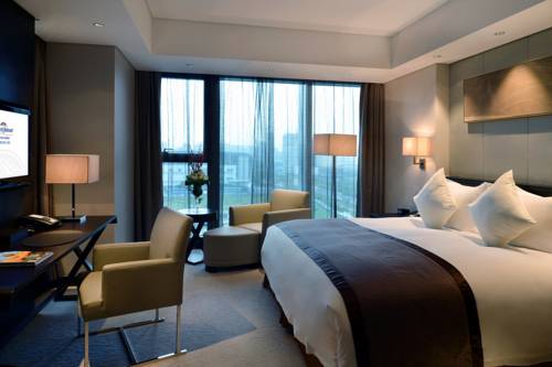 Фото Howard Johnson Ifc Plaza Ningbo