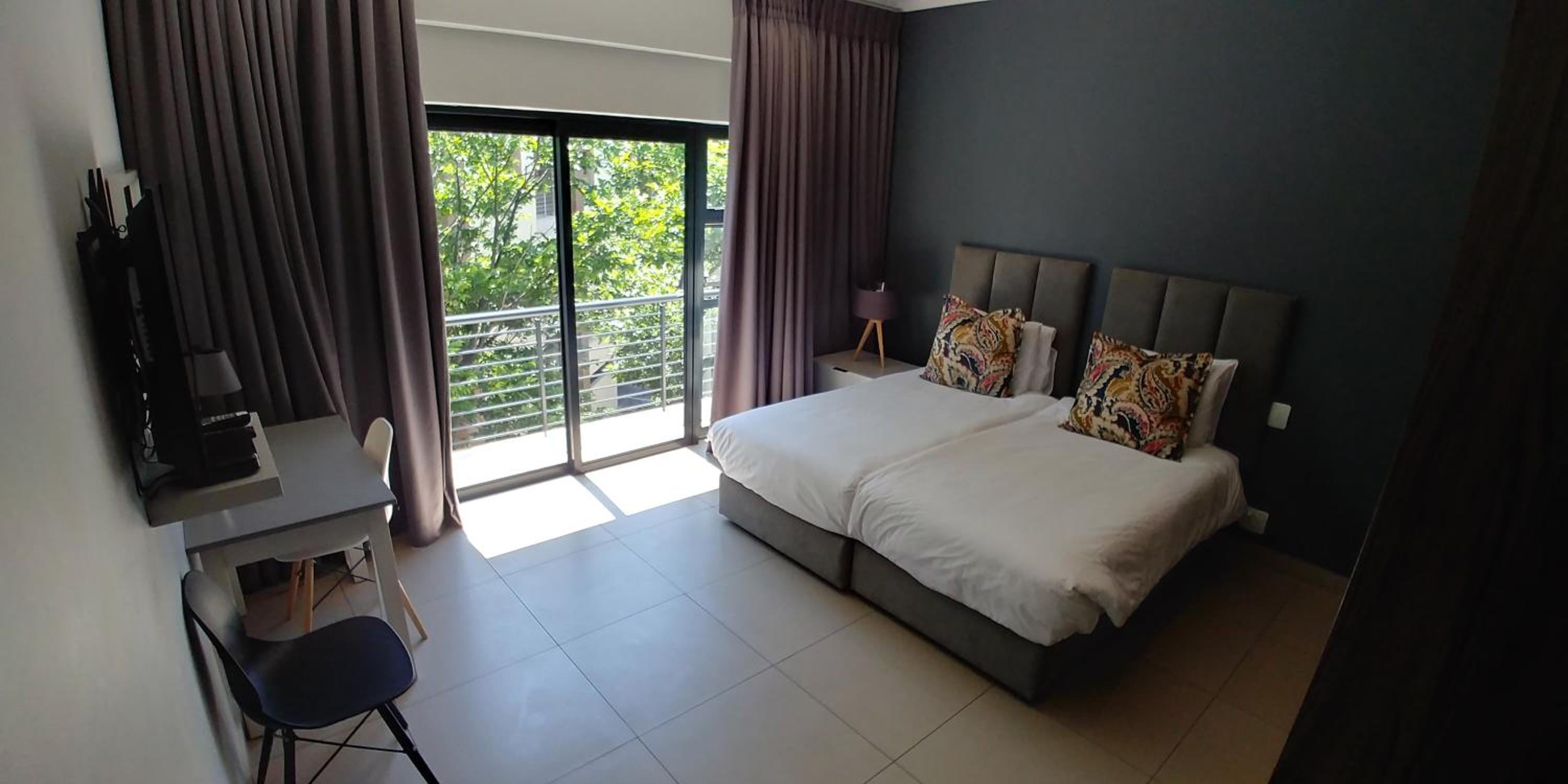 Фото Odyssey Luxury Apartments