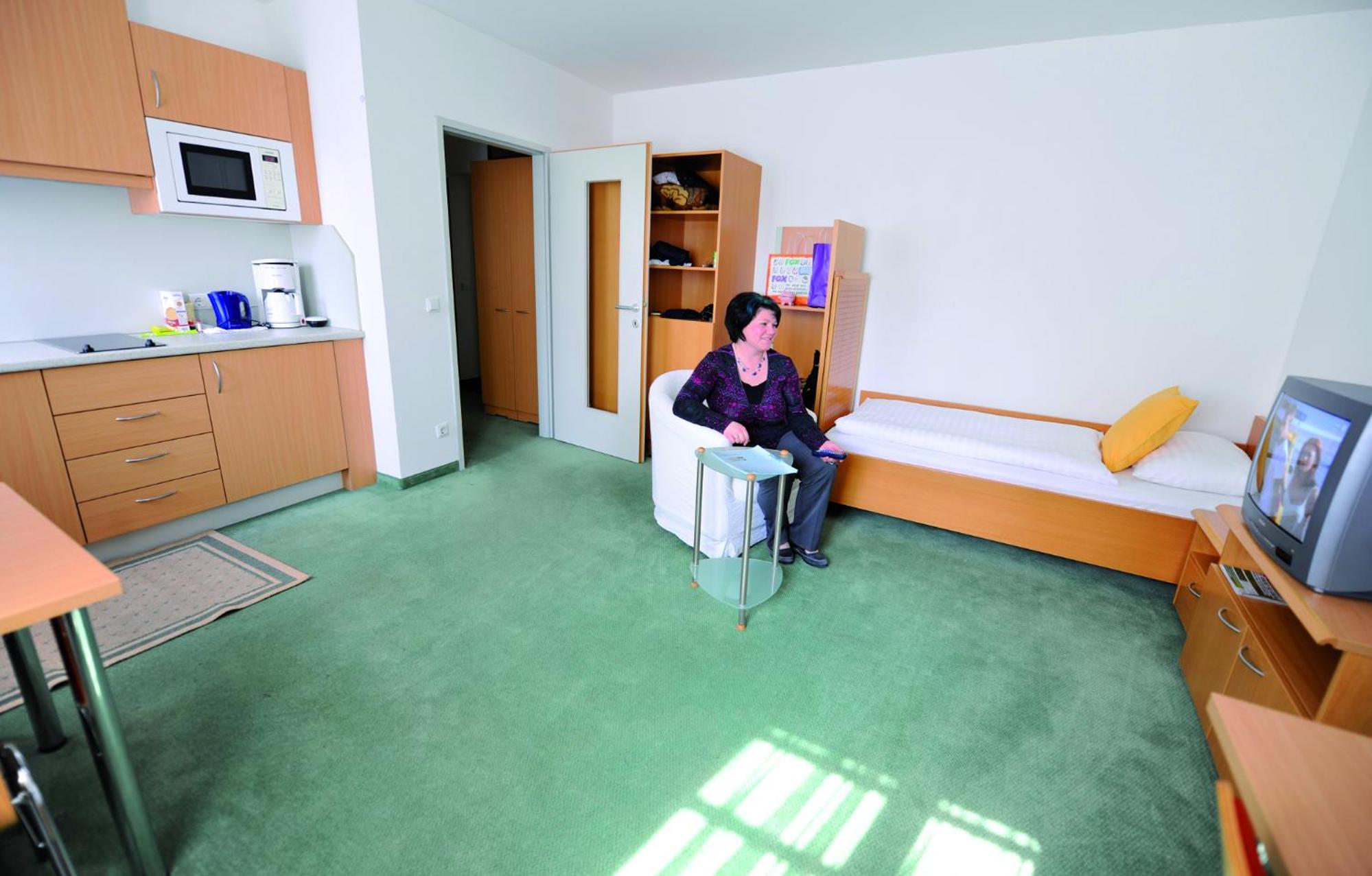 Фото Stadtoase Kolping Hotel