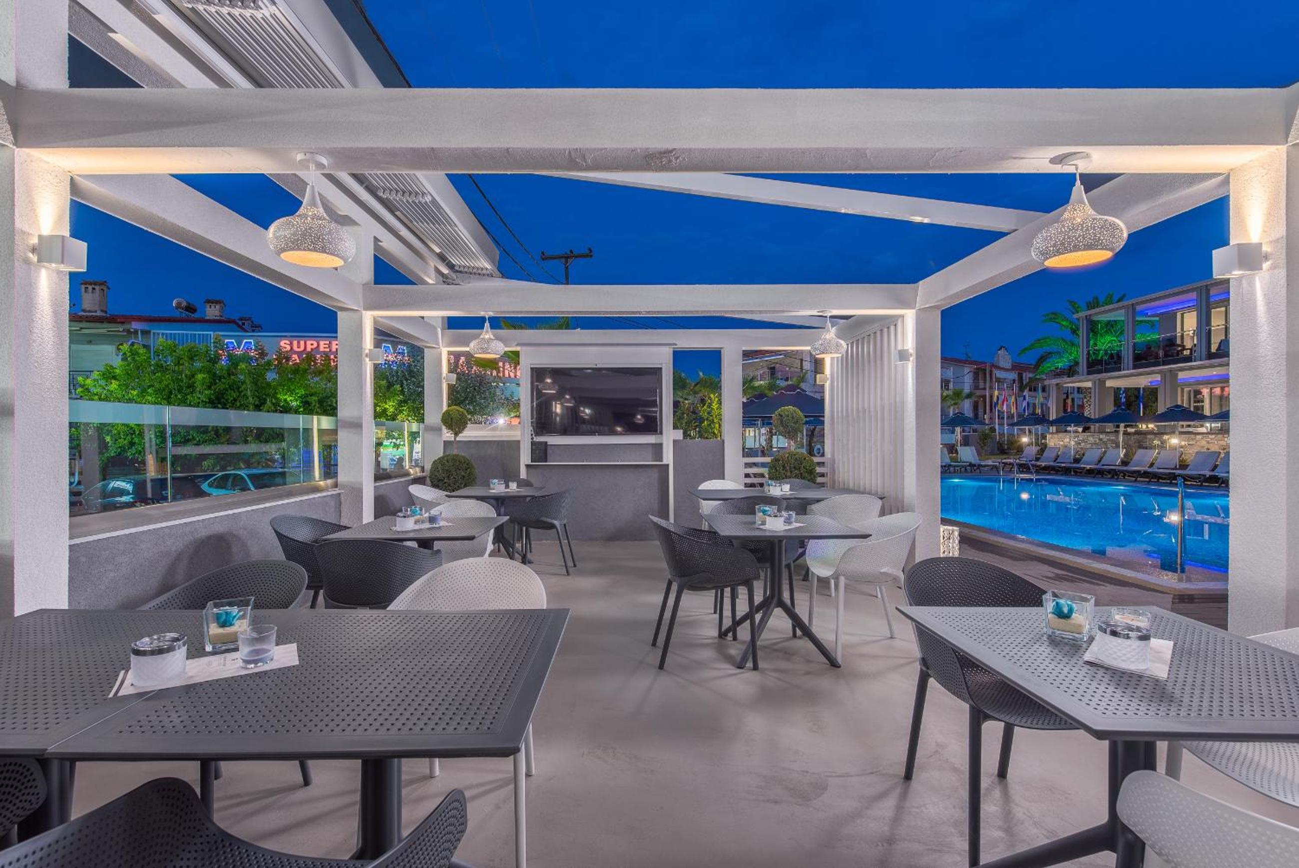 Фото Dionysos Hotel & Suites