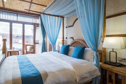 Гостиница Lijiang Yue Tu Inn