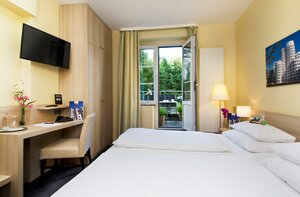 Гостиница Hotel Am Hofgarten