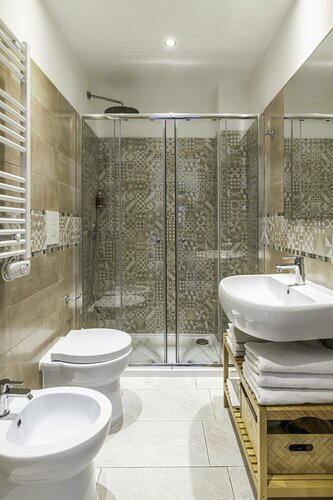 Гостиница Colibrì Prestige Rooms в Кальяри
