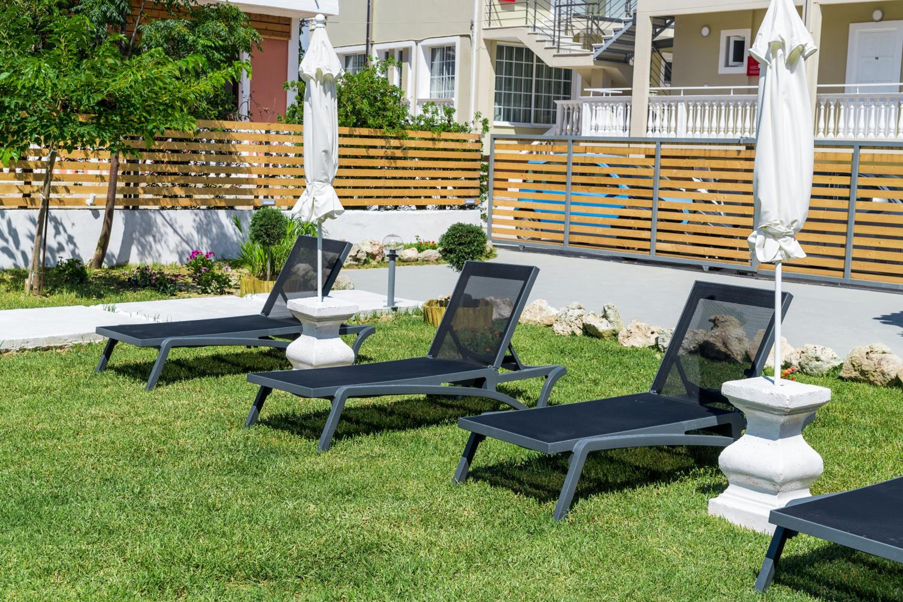 Фото Rooms 48 by Zante Plaza