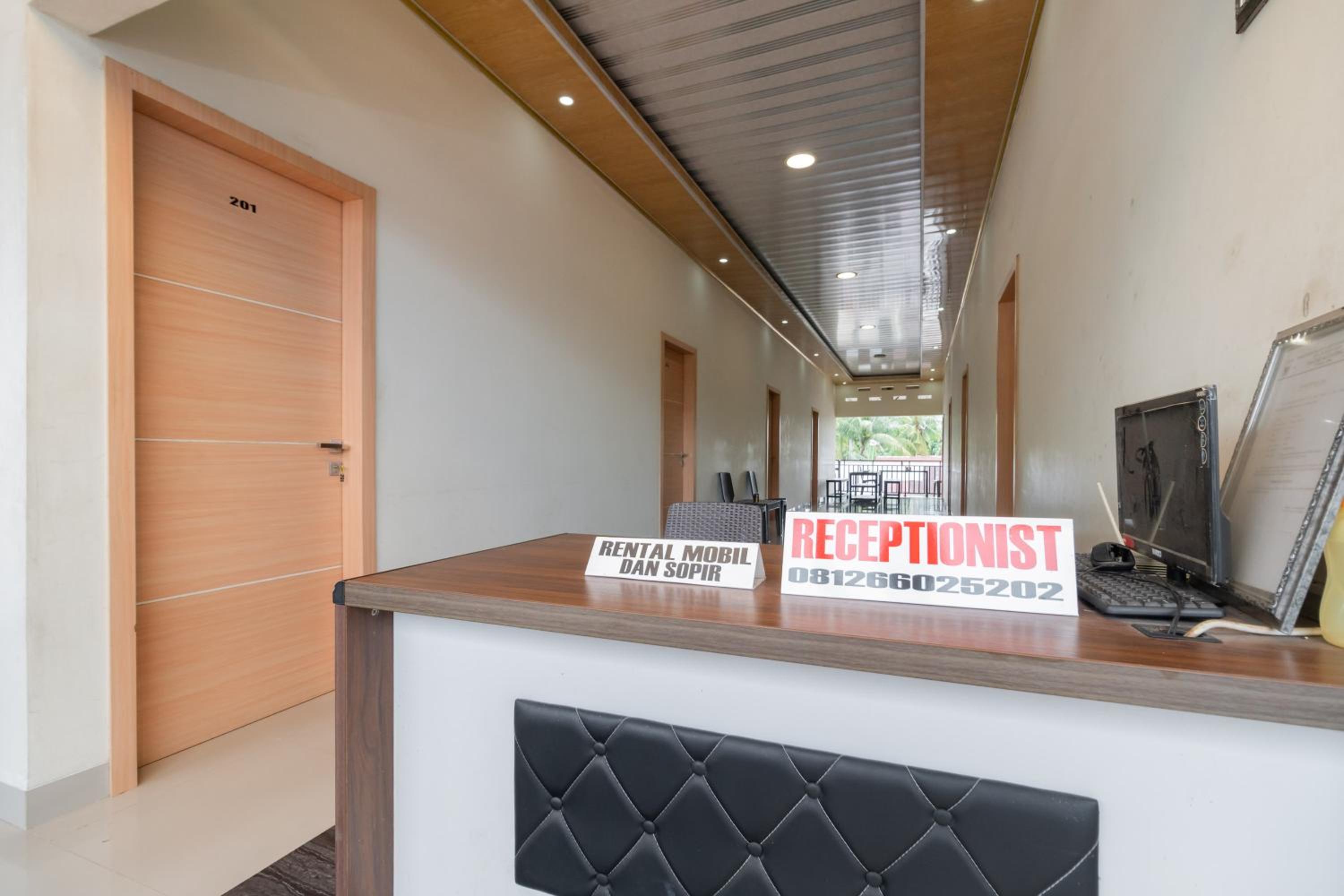 Фото Oyo 1648 Penginapan Three Joye