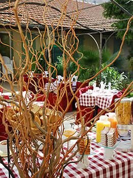 Фото Au Saint Roch - Hôtel et Jardin