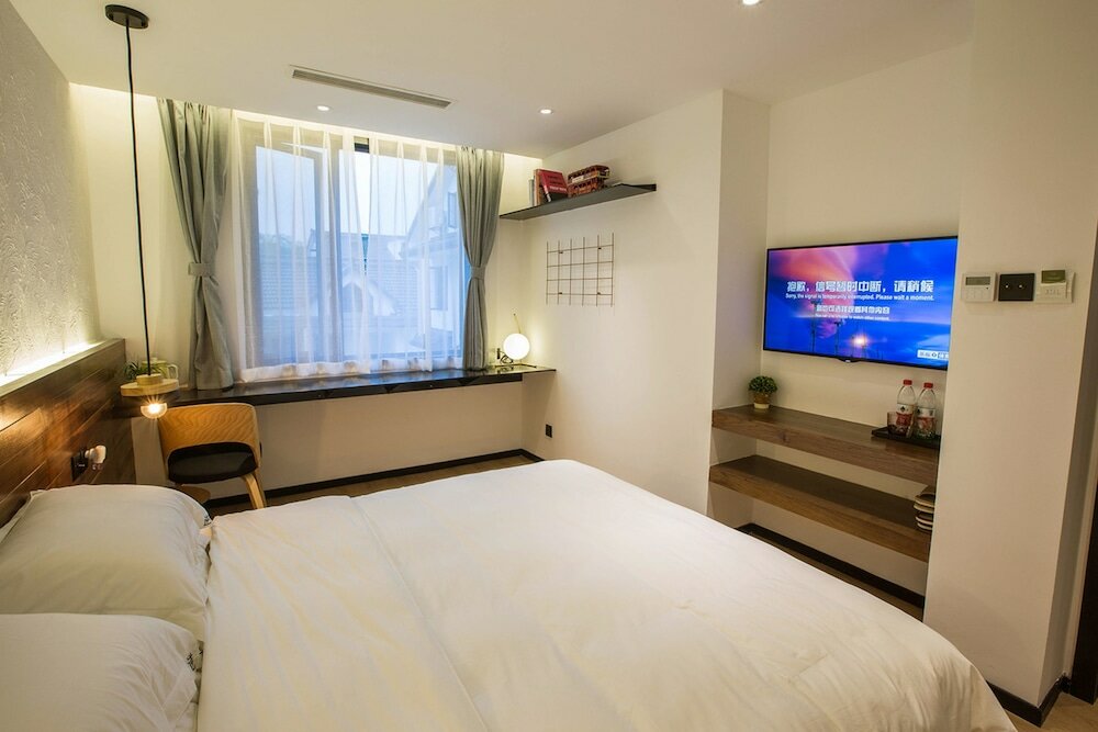 Фото Hangzhou Backlighting Inn