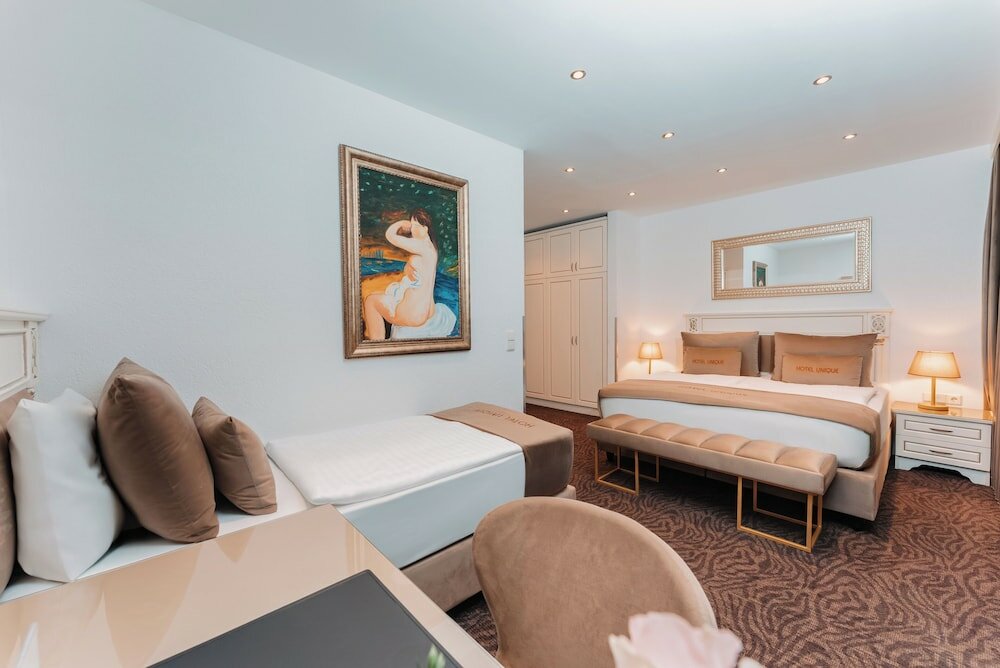 Фото Отель Unique Dortmund