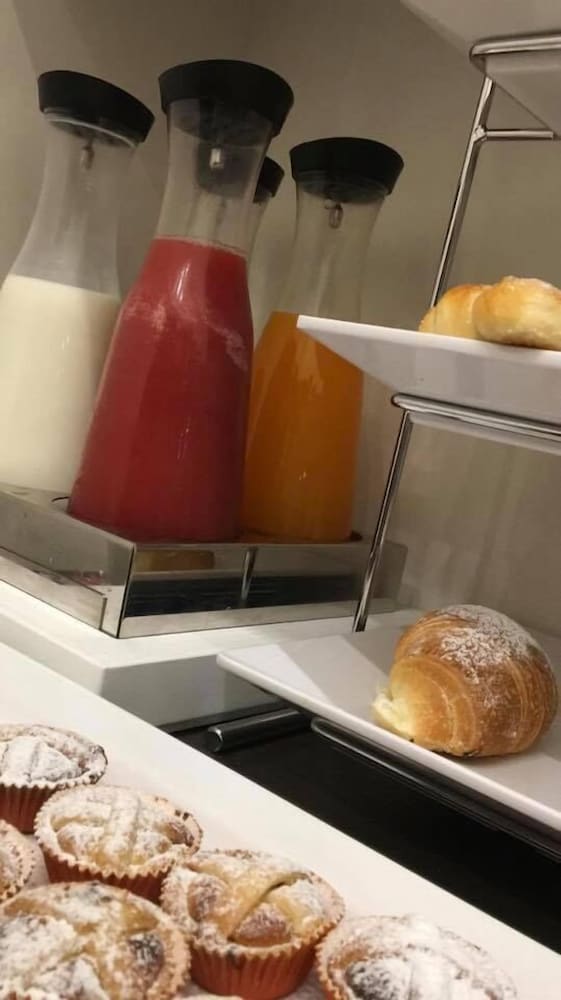 Фото Napoli Class Luxury Rooms & Suites