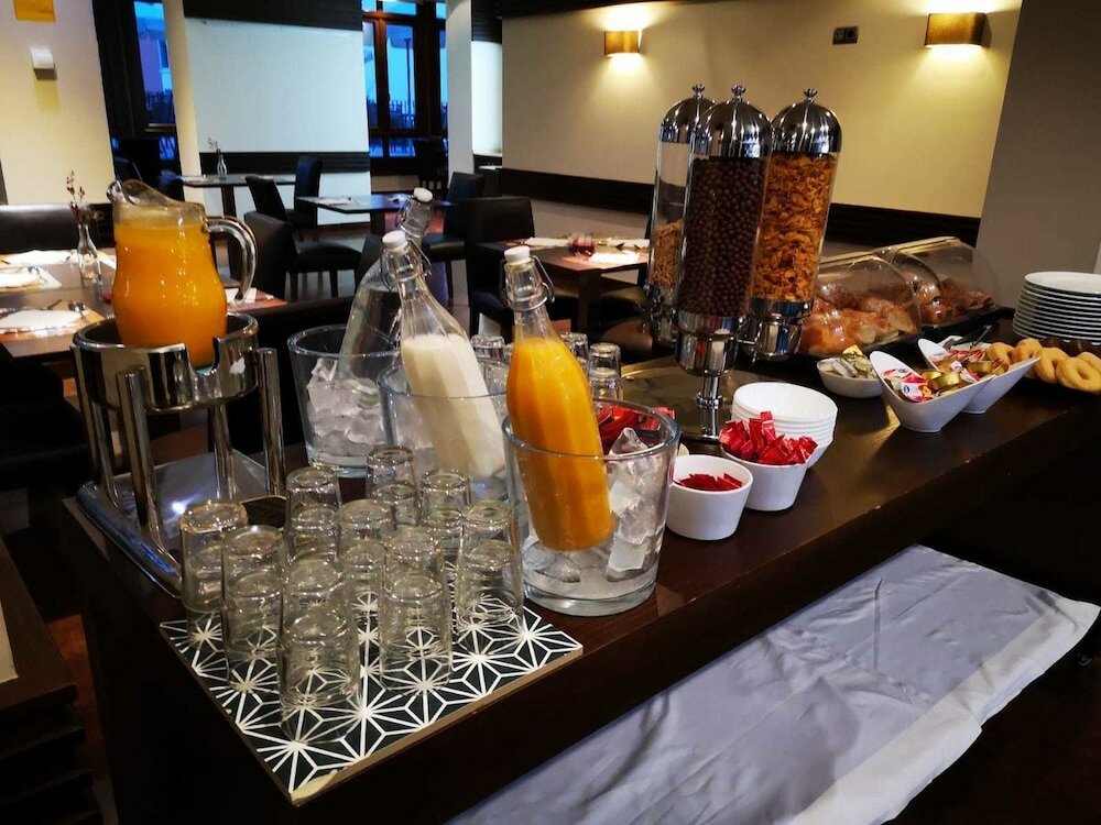 Фото Aparthotel Ciudad de Aranda