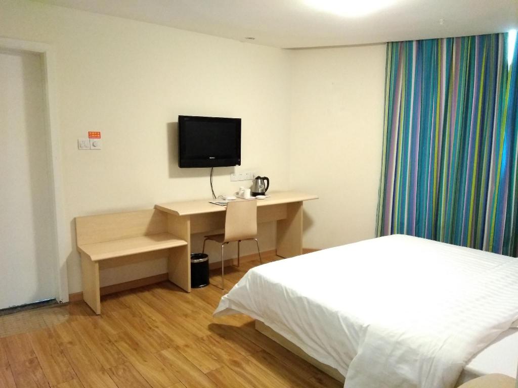 Фото 7Days Inn Chain Hotel Chongqing Wanzhou Gaosuntang Chongbai