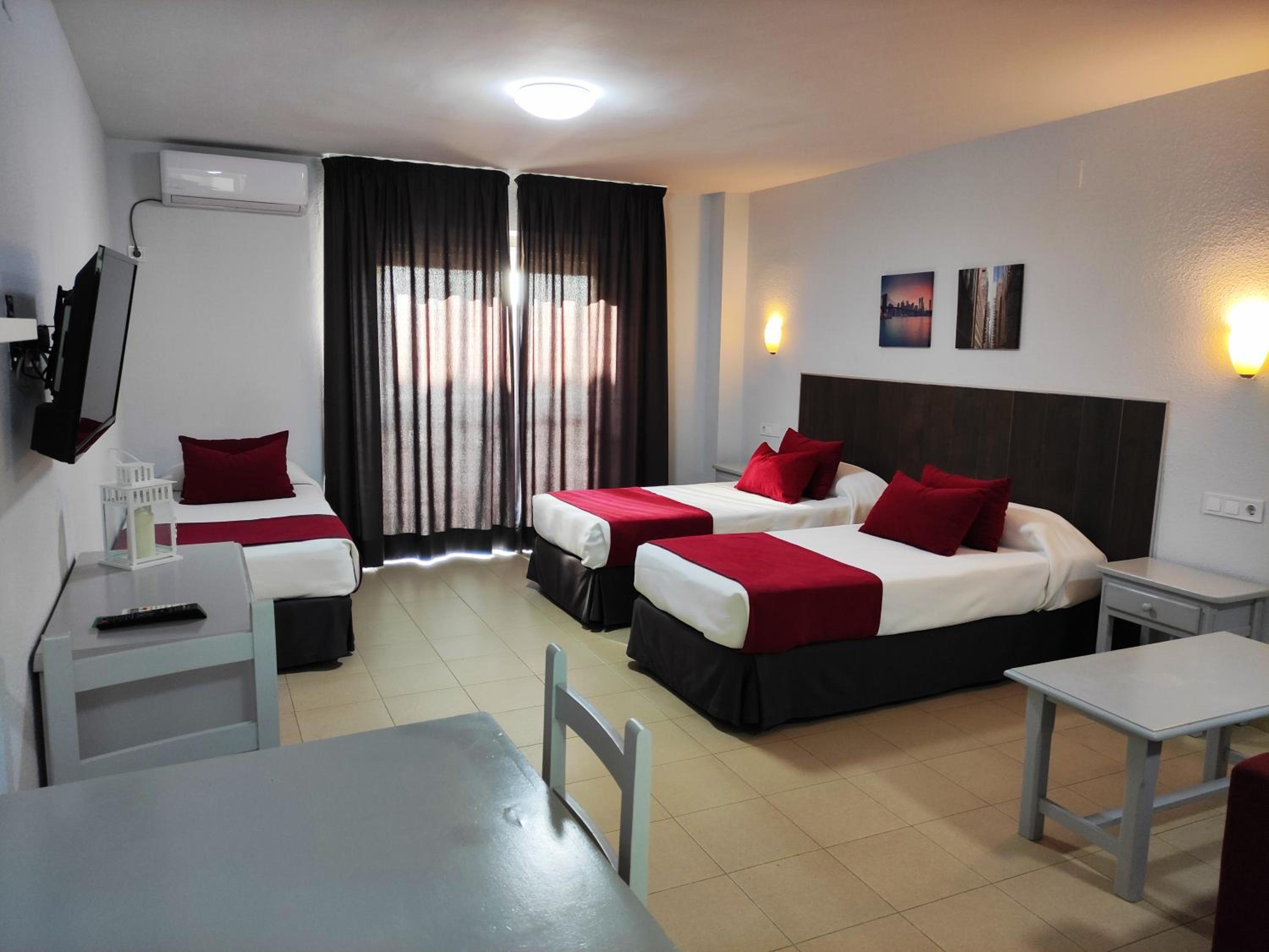 Фото Apartamentos Puerta del Sur