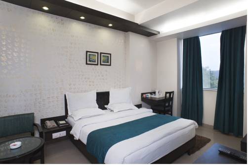 Фото Hotel Rockland Panchsheel Enclave