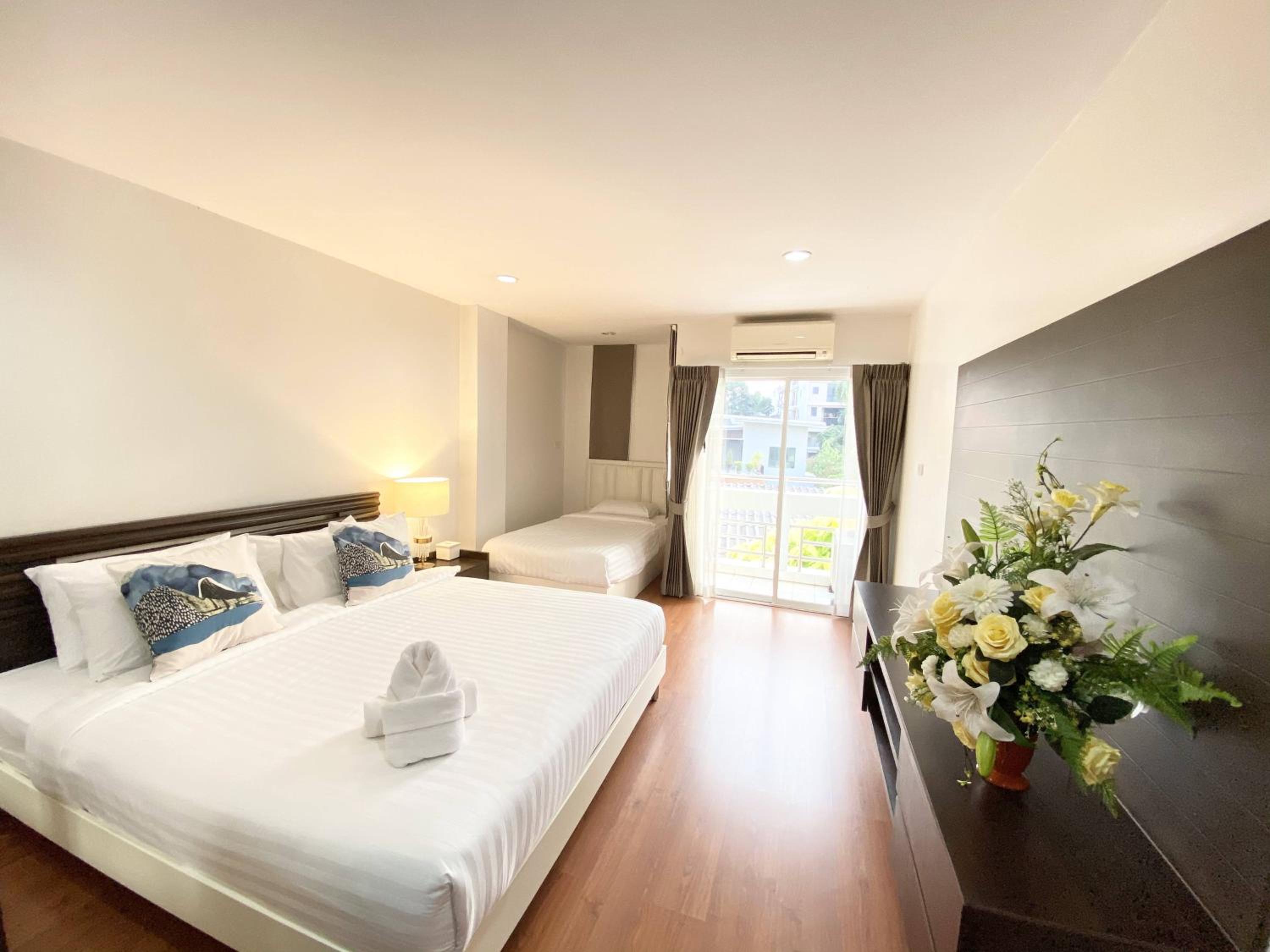 Фото 14 Place Sukhumvit Suites - Sha Plus