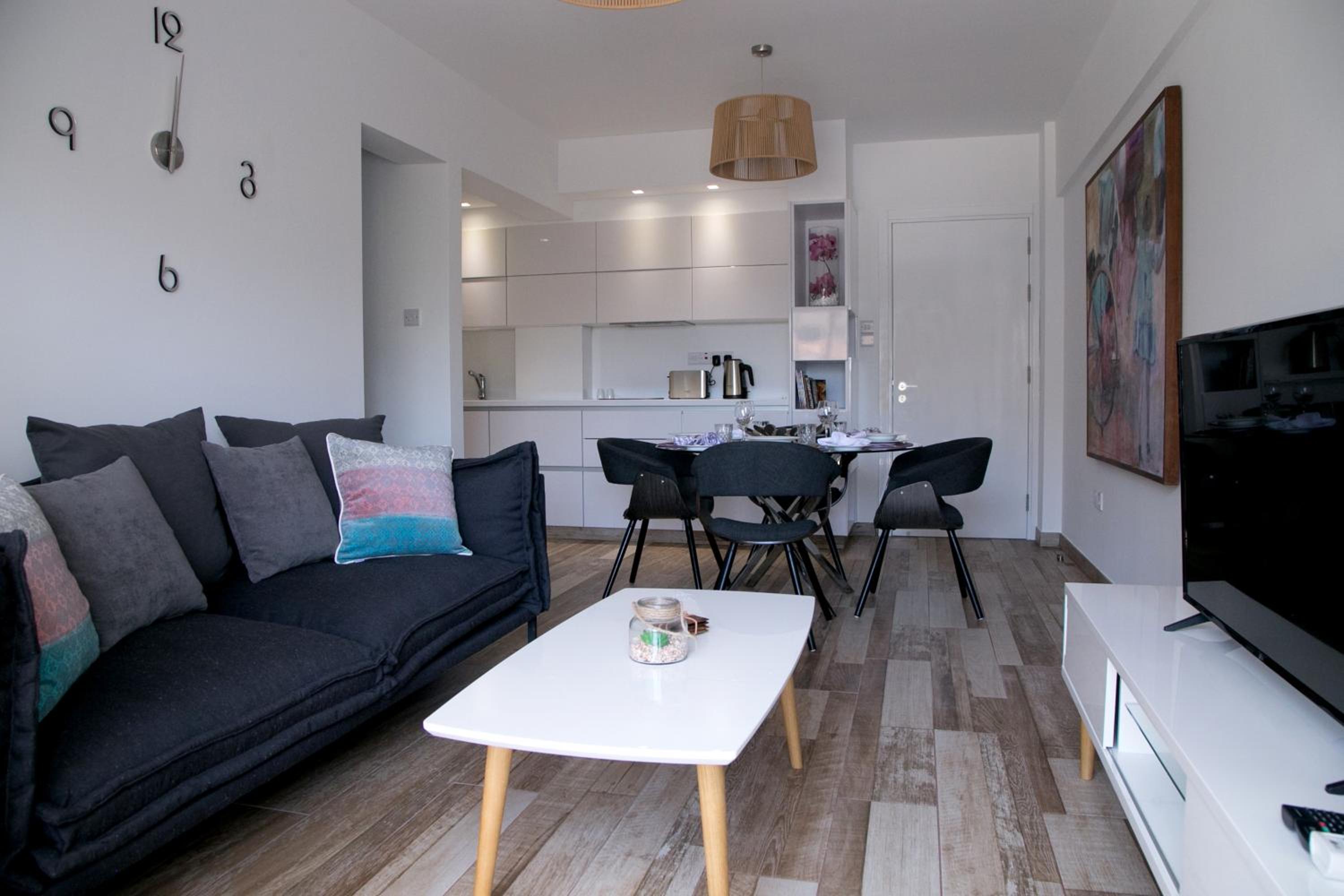 Фото Corina Suites and Apartments