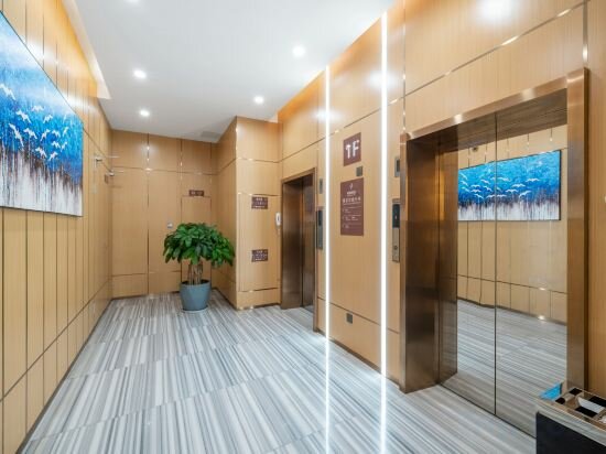 Фото GYA Xin Hotel (Xiamen Railway Station Lianban Mingfa Commercial Plaza)