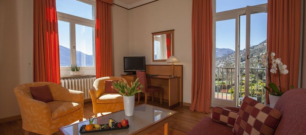 Фото E-Rooms Minusio