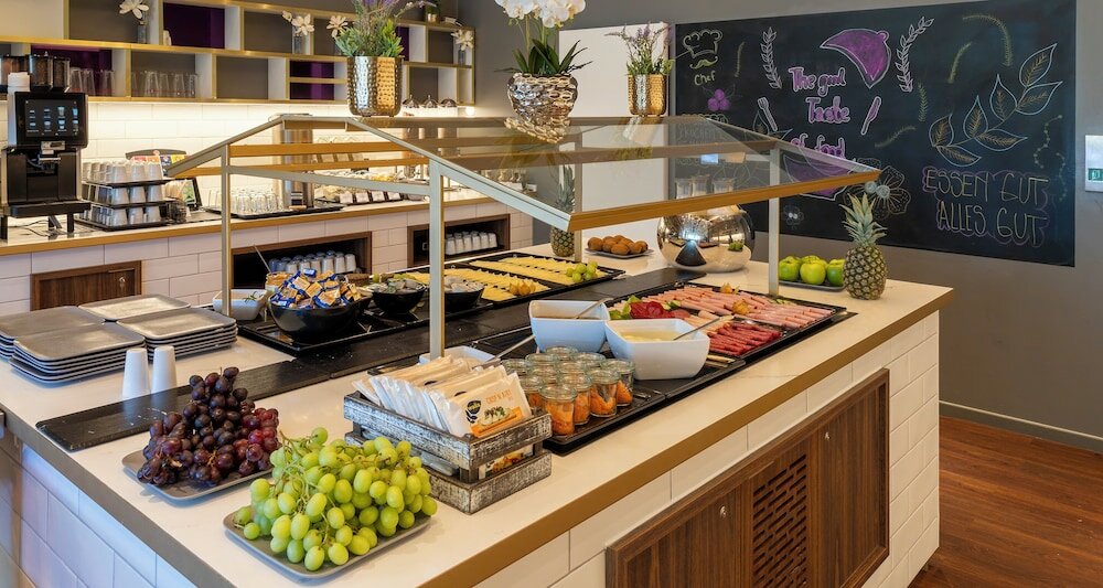 Фото Plaza Premium Muenchen