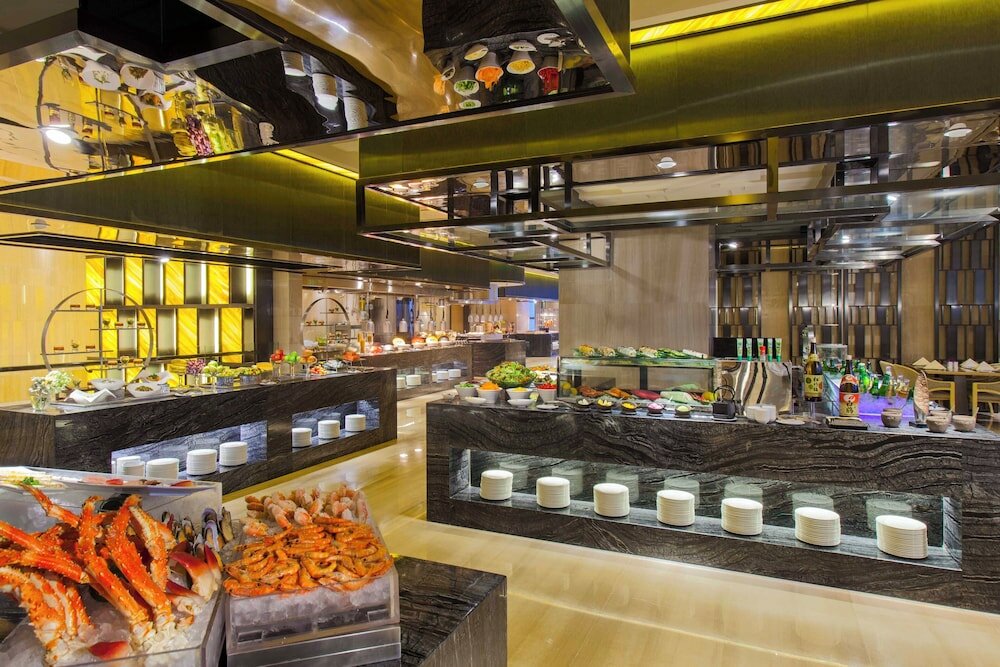 Фото Crowne Plaza Tianjin Meijiangnan