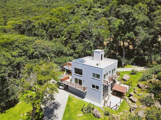 Фото Casa de Vidro - Hospedar com Propósito