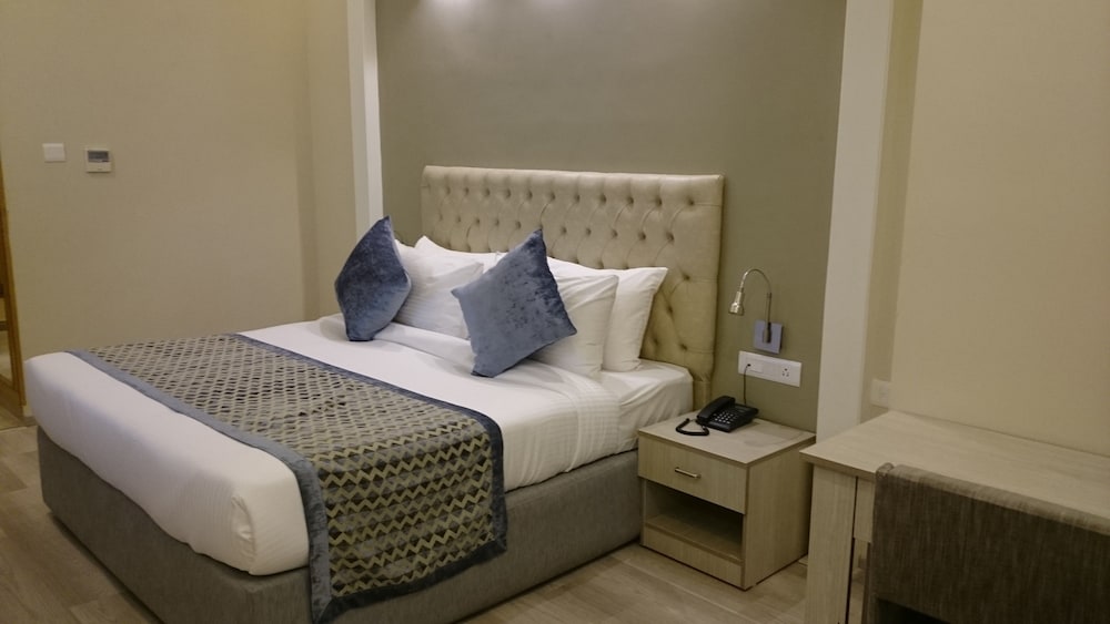 Фото Mango Hotels Naveen