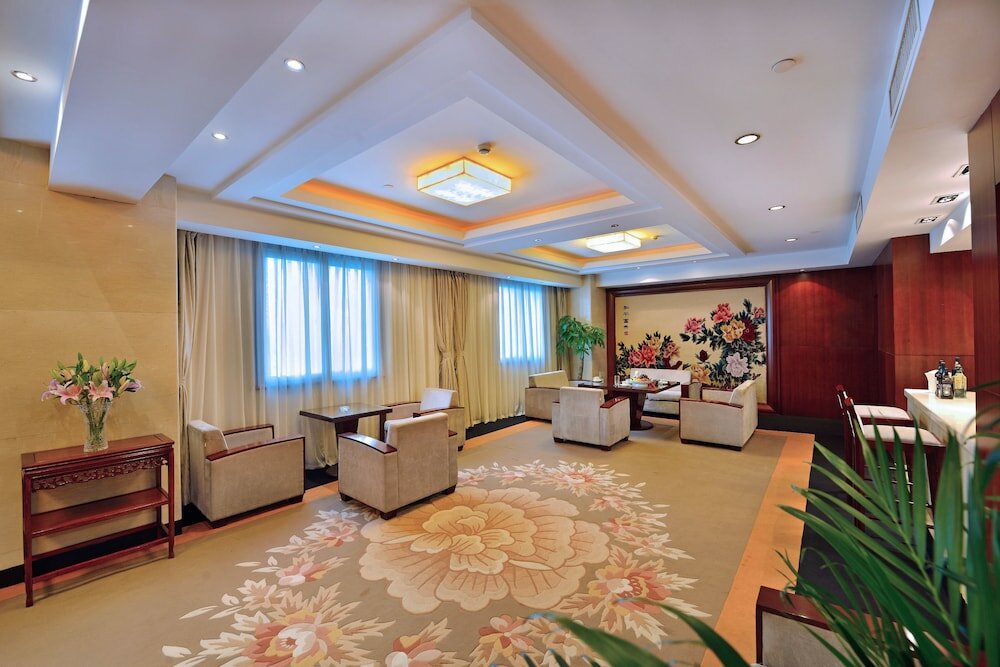 Фото Excemon Hefei Peace Hotel